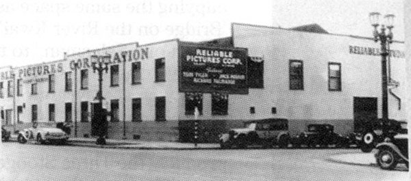 A rare photo of Reliable Pictures owned by Harry S. Webb and Bernard B. Ray from ‘33 to ‘37. The studio was at the corner of Sunset Blvd. and Beachwood Dr. where the new Technicolor post-production facility is now located. Webb and Ray produced some 45 pictures in those four years. Westerns with Jack Perrin, Bud ‘n’ Ben, Tom Tyler, Rin Tin Tin Jr., and Bob Custer. Note Tyler’s, Perrin’s and Richard Talmadge’s names on the sign. 