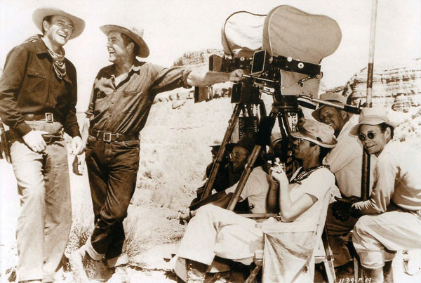 John Wayne and Grant Withers share a laugh while making “In Old Oklahoma”  (‘43 Republic). (Thanx to Bobby Copeland.)