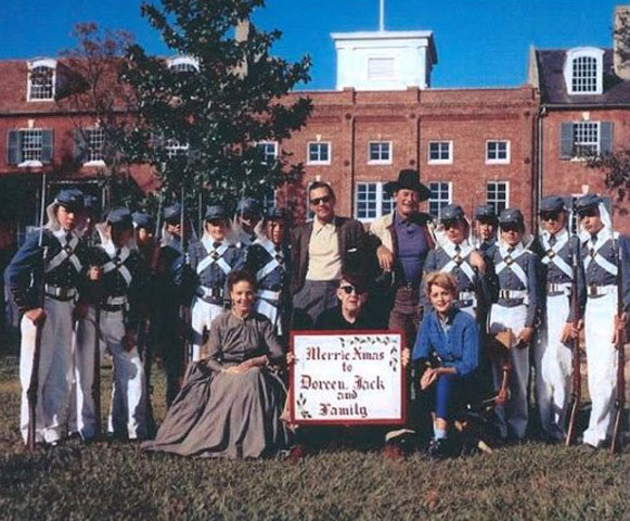 “The Horse Soldiers” was filmed in Louisiana and Mississippi between Oct. ‘58 and Jan. ‘59. Celebrating Christmas are (standing) William Holden and John Wayne, (seated) Anna Lee, John Ford, Constance Towers.