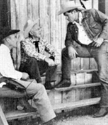 Tris Coffin and Kelo Henderson chat with John Redmond between scenes of “26 Men”. Redmond was one of the original members of the Arizona Rangers on which the TV series was based.