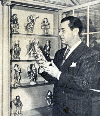 Johnny Mack Brown looks over his household collection of antiques. These are Chelseas, one for each month of the year. Photo taken in early ‘46.