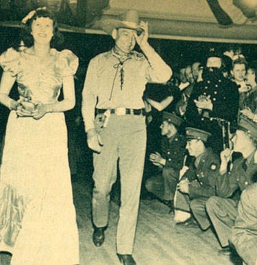 Buck Jones escorts ?? into the Warner Bros. premiere of "Virginia City" in Reno, NV, in 1940. 