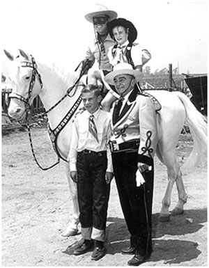 Clayton Moore on the original Silver with Joan and William Mohr, Sheriff Biscailuz at the Sheriff’s annual rodeo.