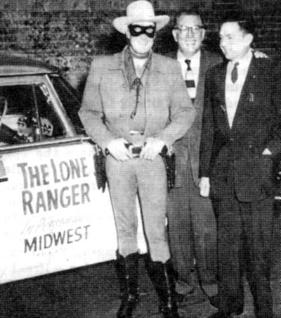 Clayton Moore is welcomed to Oklahoma City, OK, by Warner Theatre managers while promoting the 1956 “Lone Ranger” movie.