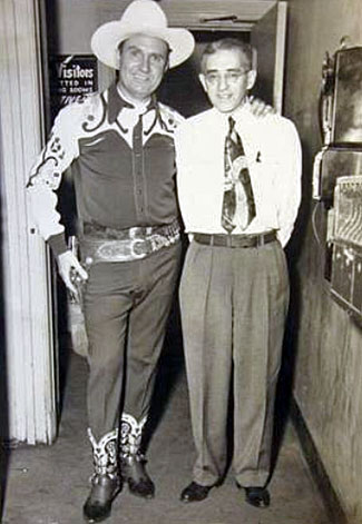 Gene poses with an unknown theatre owner. (Thanx to Jerry Whittington.)
