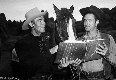 Randolph Scott and Jocko Mahoney check over the script for “The Doolins of Oklahoma” ( ‘49 Columbia). (Thanx to Bobby Copeland.)