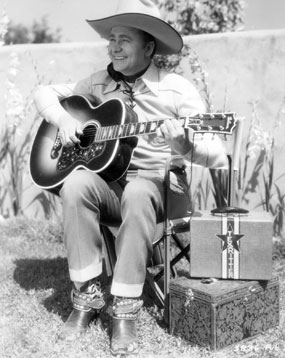 Rehearsing on the range—Tex Ritter.