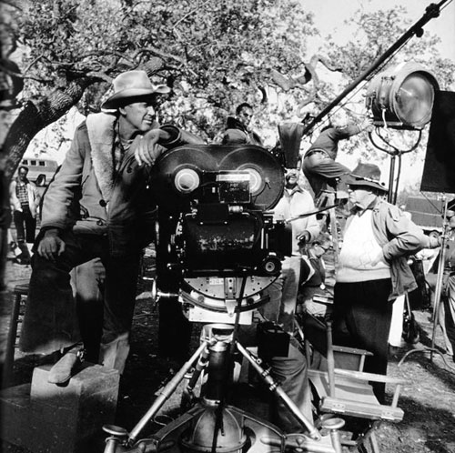 James Stewart and director John Ford await the next scene setup on “Two Rode Together” (‘61). (Thanx to Jerry Whittington.)