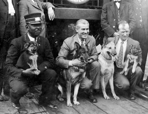 Dog owner Lee Duncan and Rin Tin Tin (center) at the Alvarado Hotel in Albuquerque, NM, circa 1925.