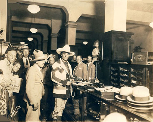 Art Acord and Tom Mix do a little shopping at an Oklahoma City men’s store in the ‘20s. (Thanx to Jerry Whittington.)