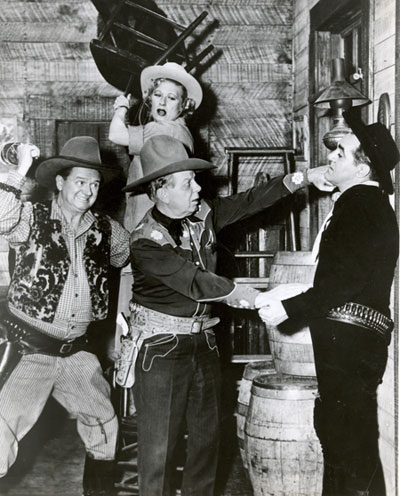 Hoot Gibson delivers a punch to Jim Backus as Joan Davis and Wally Brown come at Hoot from behind on Joan’s popular “I Married Joan” sitcom (‘52-‘55).