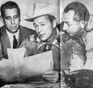 Roy with manager Art Rush (left) and publicity man Al Rackin.