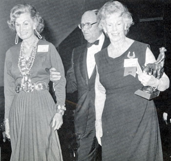 Mrs. Buck Jones (right) and daughter Maxine Firfires (left) are escorted by Gene Autry at the induction of Buck Jones into the Hall of Great Western Performers at the Cowboy Hall of Fame in 1973. Jones died in 1942.
