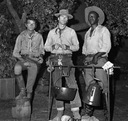 David Watson, Clint Eastwood and Raymond St. Jacques prepare for a “Rawhide” campfire scene on July 20, 1965.