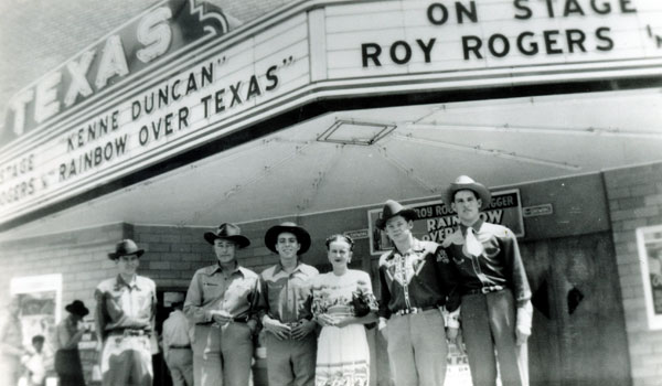 (L-R) Billy Russell, Kenne Duncan, Dale Berry, Fran Russell, Danny Warren, Don Clay for a personal appearance at the Texas Theatre in Texas City in April 15, 1947. According to Kenne’s notes on the back of the photo, the group left that night for Houston and the next day, April 16, a ship (the French registered S. S. Grandcamp docked in port) exploded in the channel destroying the entire city of Texas City. The explosion caused gasoline refineries to explode which was highly volatile and leveled the entire city including the Texas Theatre. 581 people were killed. (Thanx for the photo to Jan Garfield.)