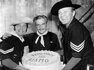 Anyone have an idea why Larry Storch and Forrest Tucker would be presenting Bob Steele (Trooper Duffy on “F-Troop”) a cake saying “Remember the Alamo”?