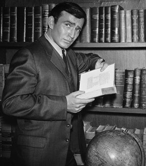 James Drury with a copy of the book that made he and his TV series famous, THE VIRGINIAN by Owen Wister.