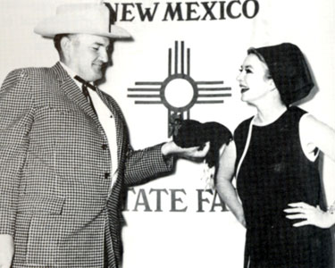 In 1965 at the New Mexico State Fair in Tingley Coliseum, Ken Curtis subbed for a ailing Roger Miller and brought the house down with his own version of “King of the Road”. The same year Amanda Blake (below) is shown with her prize winning hen at the fair.