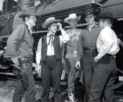 Robert Culp of TV’s “Trackdown&qrduo; and his wife ,singer Johnny Western, Mr. and Mrs. David Janssen at a personal appearance in Dodge City, KS, in Septemer 1958.