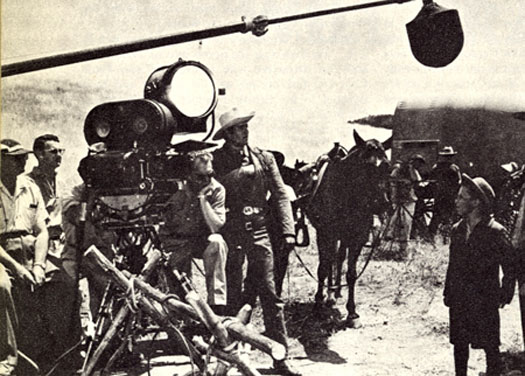 Clint Walker and crew prepare for a “Cheyenne” scene.