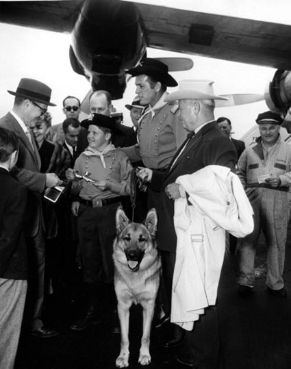 Corporal Rusty (Lee Aaker), Lt. Rip Masters (James Brown) and Rin Tin Tin receive some sort of airline award circa 1956.