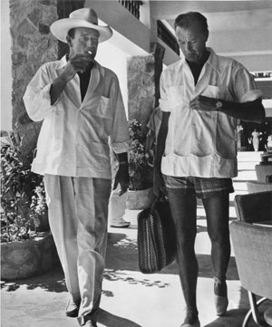 John Wayne and Gary Cooper dressed for a relaxing day at the beach.