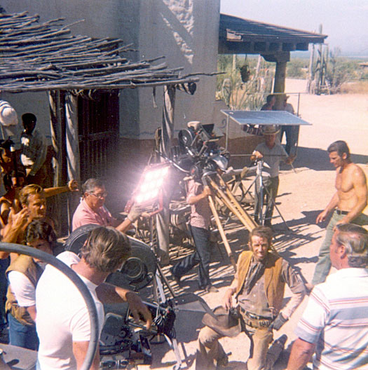 Stuntman/actor Neil Summers (kneeling) gets ready to film a scene at Old Tucson for “Gunsmoke: Matt’s Love Story”.