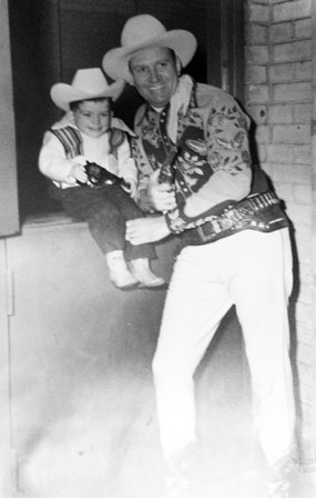 Gene Autry with a very young fan.
