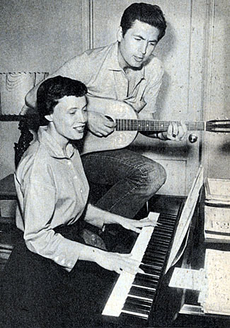 Davy Crockett...Fess Parker, a guitar player since college days, composes a tune in 1955 with his then girfriend Marcy Rinehart.