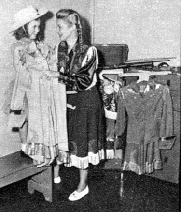 Mama Gail Davis readies her daughter Terrie for her first photo shoot in 1958.