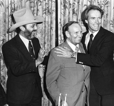 L.A. Angels’ owner Gene Autry with Viva Records co-owners Snuff Garrett and Clint Eastwood at a cocktail reception in L.A. December 1, 1982 to celebrate Viva’s second anniversary. The event marked the debut of the soundtrack album for Eastwood’s “Honkytonk Man”.