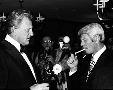 James Arness seems to look disapprovingly upon brother Peter Graves’ smoking.