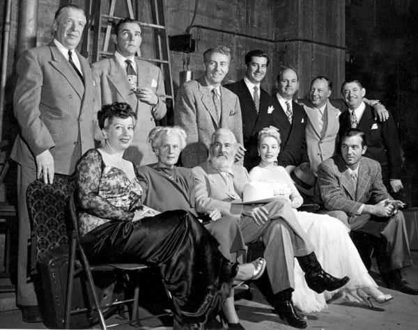 Back stage waiting to appear at the premiere of “El Paso” in Oklahoma City on March 26, 1949 are (L-R standing) Paramount exec Duke Clark, actor Paul Hogan (husband of Helen Forrest), Frank Faylen, Eduardo Noriega, theatre manager George Spelvin, co-producer Bill Thomas, songwriter Harry Revel. (L-R sitting) famous songtress Helen Forrest, Mr. and Mrs. Gabby Hayes, Mary Beth Hughes, John Payne.