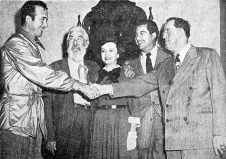 John Payne, Gabby Hayes, Mrs. Bill Thomas (wife of producer Bill Thomas) and Eduardo Noriega receive a warm welcome to El Paso for the premiere of “El Paso” from John Paxton (right, manager of Inter-State Theatres).
