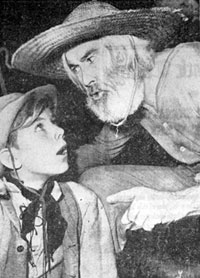 Young actor Bobby Ellis gets a few tips from Gabby Hayes at the premiere of “El Paso” (3/25/49).