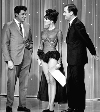 Dale Robertson, Raquel Welch and Gig Young on TV’s “Hollywood Palace”. (Thanx to Terry Cutts.)