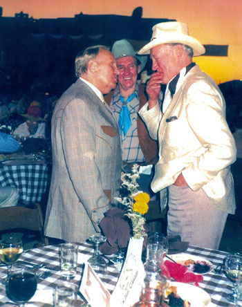 Gene Autry shares a little humor with a bemused Charles Starrett and Pat Buttram at a Hollywood function. (Thanx to John Buttram.)