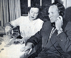 Gene Autry talks a little business while his wife Ina pours a cup of coffee. The couple was married from 1932 until her death in 1980.