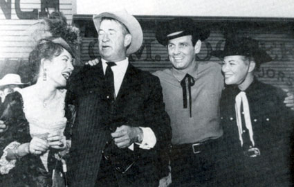 Amanda Blake, Miss Kitty on “Gunsmoke”, along with Chill Wills and Mr. and Mrs. David Janssen, in Dodge City, KS to dedicate Front Street in 1958.