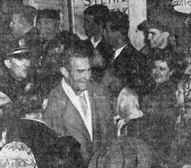 State Police formed an escort line for Randolph Scott as he arrived at the Kimo Theatre for the world premiere of “Albuquerque”.