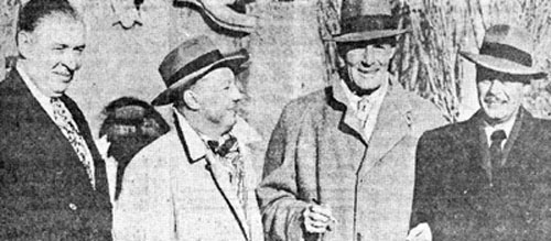 Randolph Scott and comedian Billy DeWolfe (right) arrive at the train station in Albuquerque, NM, for the world premiere of “Albuquerque”, Greeting them are Duke Clark, Paramount distribution chief for the western United States, and the film’s producer William (Bill) Thomas of Pine-Thomas.