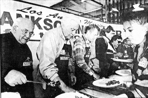 Actors Ed Asner, Cesar Romero (Cisco Kid), Earl Holliman (TV’s “Hotel de Paree”) help dish up Thanksgiving dinners for the homeless at the L. A. Mission in November ‘90.
