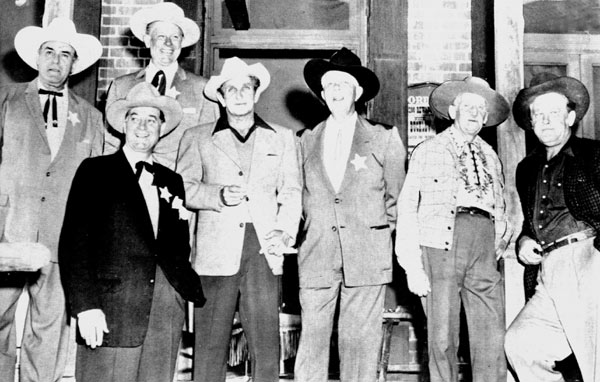 A classic cowboy reunion on the Paramount lot in the early ‘60s. (L-R) Ken Maynard, Tom Keene, Rex Lease, Bob Steele, Hoot Gibson, Raymond Hatton, Big Boy Williams.