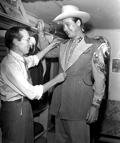 Monte Hale gets fitted for a new suit at Nudie's Western Tailor Shop.
