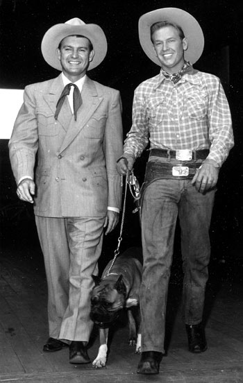 Tex Williams and Rex Allen take Rex’s dog Butch for a stroll during a break in the filming of Rex’s “Colorado Sundown” (‘52 Republic).