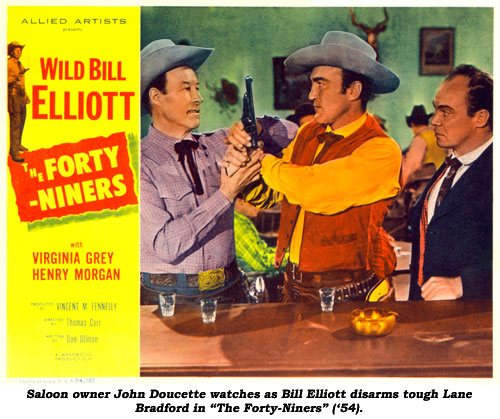 Saloon owner John Doucette watches as Bill Elliott disarms tough Lane Bradford in "The Forty-Niners" ('54).