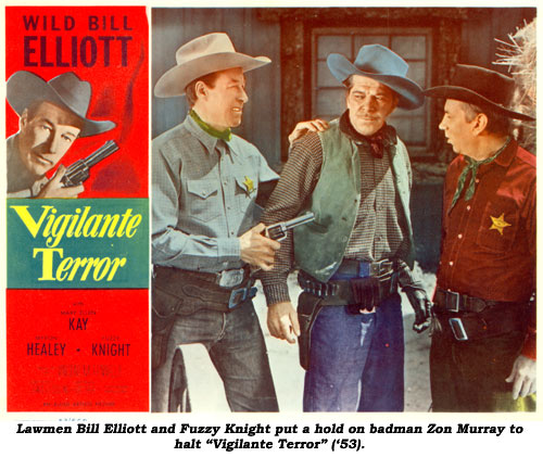 Lawmen Bill Elliott and Fuzzy Knight put a hold on badman Zon Murray to halt "Vigilante Terror" ('53).