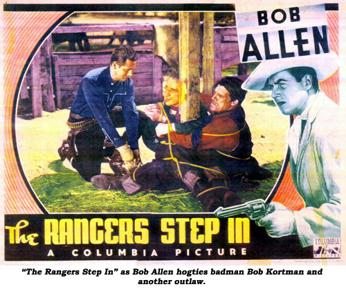 "The Rangers Step In" as Bob Allen hogties badman Bob Kortman and another outlaw.