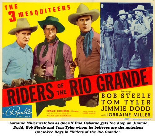 Lorraine Miller watches as Sheriff Bud Osborne gets the drop on Jimmie Dodd, Bob Steele and Tom Tyler whom he believes are the notorious Cherokee Boys in "Riders of the Rio Grande".