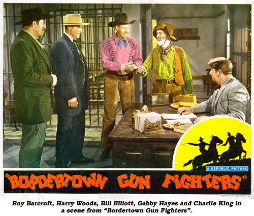 Roy Barcroft, Harry Woods, Bill Elliott, Gabby Hayes and Charlie King in a scene from "Bordertown Gun Fighters".